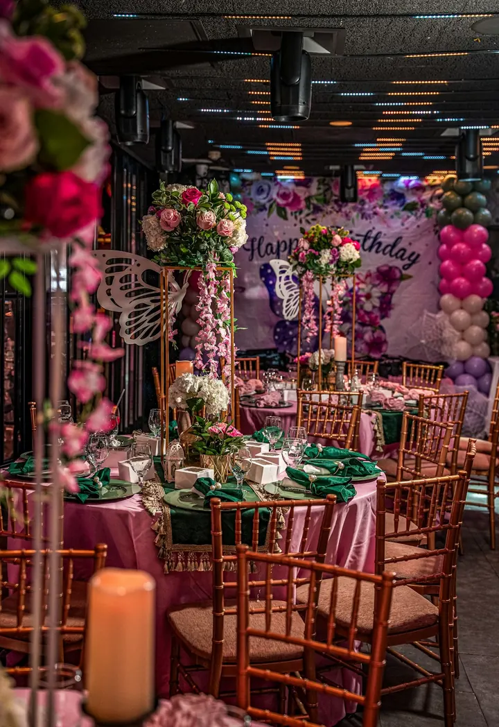 Elegant birthday dinner with flowers and celebration decor